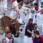 Un momento del tercer encierro de San Fermín.