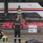 Imagenes del cuerpo de Álvaro Prieto localizado entre dos vagones de tren.