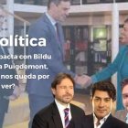 Al fondo de la imagen, se ve a Pedro Sánchez reuniéndose con Mertxe Aizpurua, diputada de Bildu