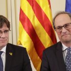 Carles Puigdemont y Quim Torra en una foto de 2019 cuando eran compañeros de Junts.