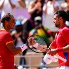 Rafa Nadal y Novak Djokovic durante un partido.