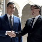 El presidente del Gobierno, Pedro Sánchez, junto al líder de Junts, Carles Puigdemont