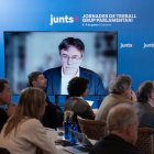 El presidente de Junts, Carles Puigdemont, interviene telemáticamente, durante una jornada de trabajo del grupo de Junts.