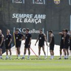 Los futbolistas del Barcelona, en un entrenamiento.