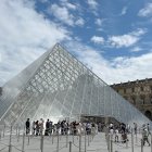 The French government has announced a program to build a new entrance to the Louvre museum, alleviating pressure on the entry point at the I.M. Pei designed glass and steel Louvre Pyramid. An international jury will pick the architects and announce their decision in 2026. The program includes a new exhibition space for La Jaconde, or the Mona Lisa. The museum is shown Thursday June 26, 2025.