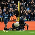 BRUGES, BELGIUM - NOVEMBER 05: Romeo Vermant of Club Brugge (floor) celebrates a goal with teammates which was later ruled out for a foul in the build-up during the UEFA Champions League 2025/26 League Phase MD4 match between Club Brugge KV and FC Barcelona at Jan Breydelstadion on November 05, 2025 in Bruges, Belgium. (Photo by Stuart Franklin/Getty Images)