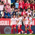 GIRONA, SPAIN - NOVEMBER 08: Viktor Tsygankov of Girona FC celebrates with teammates scoring his team's first goal during the LaLiga EA Sports match between Girona FC and Deportivo Alaves at Montilivi Stadium on November 08, 2025 in Girona, Spain. (Photo by Alex Caparros/Getty Images)