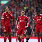 LIVERPOOL, ENGLAND - NOVEMBER 22: Virgil van Dijk, Alexis Mac Allister and Alexander Isak of Liverpool look dejected during the Premier League match between Liverpool and Nottingham Forest at Anfield on November 22, 2025 in Liverpool, England. (Photo by Molly Darlington/Getty Images)