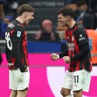 MILAN, ITALY - NOVEMBER 23: Christian Pulisic of AC Milan celebrates with his team-mate Alexis Saelemaekers after scoring their team's first goalduring the Serie A match between FC Internazionale and AC Milan at Giuseppe Meazza Stadium on November 23, 2025 in Milan, Italy. (Photo by Marco Luzzani/Getty Images)