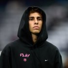 MADRID, SPAIN - OCTOBER 26: Fermin Lopez of FC Barcelona looks on as he inspects the pitch prior to the LaLiga EA Sports match between Real Madrid CF and FC Barcelona at Estadio Santiago Bernabeu on October 26, 2025 in Madrid, Spain. (Photo by Angel Martinez/Getty Images)