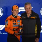 LUSAIL CITY, QATAR - NOVEMBER 28: Sprint Pole qualifier Oscar Piastri of Australia and McLaren receives his Pirelli Sprint Pole award from Mario Isola, Director of Pirelli F1 during Sprint Qualifying ahead of the F1 Grand Prix of Qatar at Lusail International Circuit on November 28, 2025 in Lusail City, Qatar. (Photo by Rudy Carezzevoli/Getty Images)