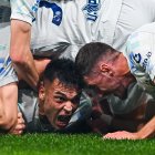 GENOA, ITALY - DECEMBER 14: Lautaro Martinez of Inter (left) celebrates with his team-mate Petar Sucic after scoring a goal during the Serie A match between Genoa CFC and FC Internazionale at Luigi Ferraris Stadium on December 14, 2025 in Genoa, Italy. (Photo by Simone Arveda/Getty Images)