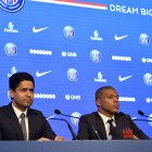 PARIS, FRANCE - SEPTEMBER 06:  (L-R) Paris Saint-Germain President Nasser Al Khelaifi and new signing Kylian Mbappe speak to the media during a press conference at the Parc des Princes on September 6, 2017 in Paris, France. Kylian Mbappe signed a five year contract for 180 Million Euro.  (Photo by Aurelien Meunier/Getty Images)