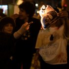 Un grupo de personas durante la concentración del movimiento ‘Mujer, Vida, Libertad’, a 13 de enero de 2026, en Barcelona.