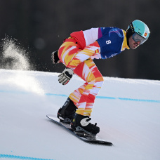 LIVIGNO, ITALY - FEBRUARY 12: Lucas Eguibar Breton of Team Spain warms up prior to the Men's Snowboard Cross Seeding on day six of the Milano Cortina 2026 Winter Olympic games at Livigno Snow Park on February 12, 2026 in Livigno, Italy. (Photo by Hannah Peters/Getty Images)