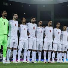 DOHA, QATAR - JUNE 05: Players of Iran line up prior to the FIFA World Cup 2026 Qualifier match between Qatar and IR Iran at Jassim Bin Hamad Stadium on June 05, 2025 in Doha, Qatar.  (Photo by Mohamed Farag/Getty Images)