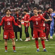 ISTANBUL, TURKEY - MARCH 26: Ferdi Kadioglu and Arda Guler of Turkiye celebrate after the team's victory in the FIFA World Cup 2026 European Qualifiers KO play-offs match between Türkiye and Romania at Besiktas Park on March 26, 2026 in Istanbul, Turkey. (Photo by Burak Kara/Getty Images)