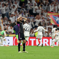 MADRID, SPAIN - MAY 08: Noussair Mazraoui of Bayern Munich reacts after Joselu of Real Madrid (hidden) scored his sides second goalduring the UEFA Champions League semi-final second leg match between Real Madrid and FC Bayern München at Estadio Santiago Bernabeu on May 08, 2024 in Madrid, Spain. (Photo by Alexander Hassenstein/Getty Images)
