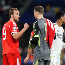 MADRID, SPAIN - APRIL 07: Harry Kane of FC Bayern Munich speaks to teammate Manuel Neuer after the UEFA Champions League 2025/26 Quarter-Final First Leg match between Real Madrid CF and FC Bayern München at Estadio Santiago Bernabeu on April 07, 2026 in Madrid, Spain. (Photo by Angel Martinez/Getty Images)