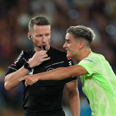 VALENCIA, SPAIN - AUGUST 23: Gavi of FC Barcelona interacts with referee Alejandro Hernandez  during the LaLiga EA Sports match between Levante UD and FC Barcelona at Ciutat de Valencia on August 23, 2025 in Valencia, Spain. (Photo by Alex Caparros/Getty Images)