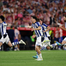 SEVILLE, SPAIN - APRIL 18: Jon Martin of Real Sociedad celebrates victory alongside team mates following a penalty shoot out in the Copa Del Rey Final match between Real Sociedad and Atletico de Madrid at Estadio de La Cartuja on April 18, 2026 in Seville, Spain.  (Photo by Fran Santiago/Getty Images)