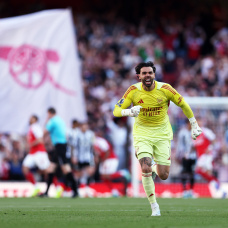 LONDON, ENGLAND - APRIL 25: David Raya of Arsenal celebrates  his team's first goal during the Premier League match between Arsenal and Newcastle United at Emirates Stadium on April 25, 2026 in London, England. (Photo by Richard Heathcote/Getty Images)