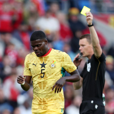 CARDIFF, WALES - JUNE 02: Thomas Partey of Ghana looks dejected as he shown a yellow card by Referee Oscar Johnson during the International Friendly match between Wales and Ghana at the Cardiff City Stadium on June 02, 2026 in Cardiff, Wales. (Photo by Ryan Hiscott/Getty Images)