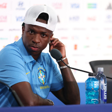 EAST RUTHERFORD, NEW JERSEY - JUNE Vinicius Junior  of Brazil speaks to the media during a press conference ahead of the FIFA World Cup 2026 Group C match between Brazil and Morocco at New York New Jersey Stadium on June 12, 2026 in East Rutherford, New Jersey. (Photo by Darrian Traynor/Getty Images)
