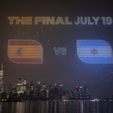 JERSEY CITY, NEW JERSEY - JULY 15:  The Final July 19 visual with the flags of Spain and Argentina is displayed against the Manhattan skyline during the FIFA Drone show in New York/New Jersey at Liberty State Park on July 15, 2026 in Jersey City, New Jersey. (Photo by David Ramos/Getty Images)
