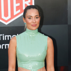 Alice Campello posando en el photocall de Tag Heuer