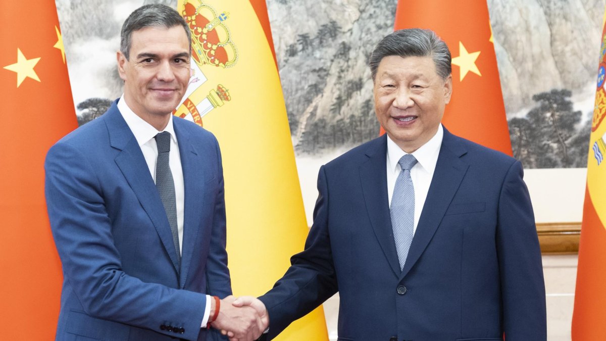 El presidente chino Xi Jinping junto a Pedro Sánchez