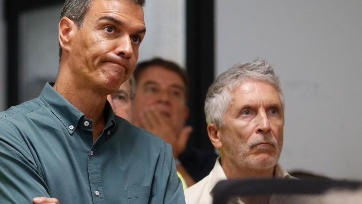 Fernando Grande-Marlaska y Pedro Sánchez