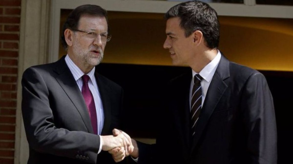 Rajoy y Sánchez durante una reunión en La Moncloa.
