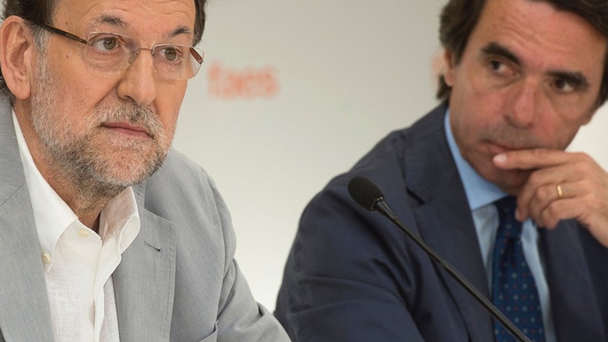 Rajoy y Aznar en un acto de FAES