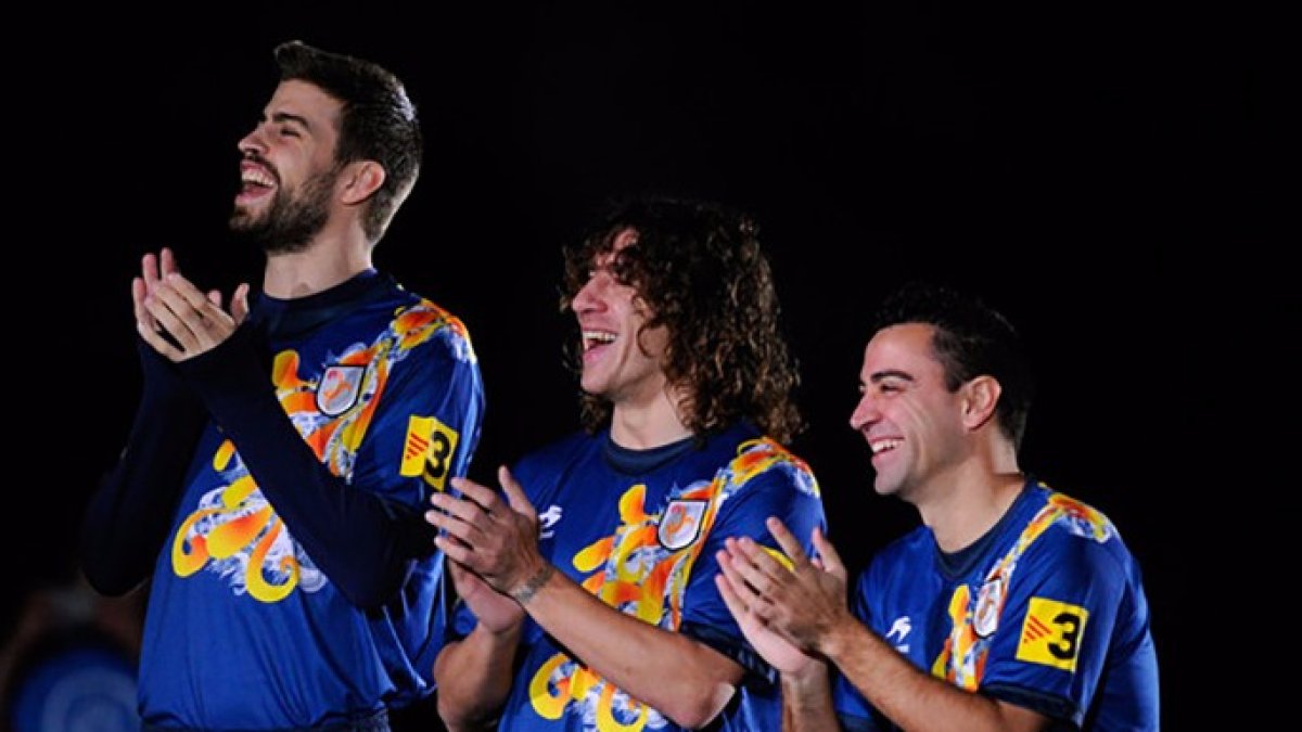 Los futbolistas del Barça Gerard Piqué, Carles Puyol y Xavi Hernández.