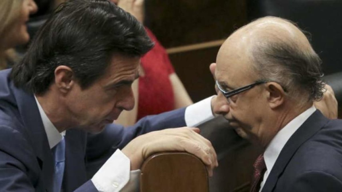 José Manuel Soria y Cristóbal Montoro.