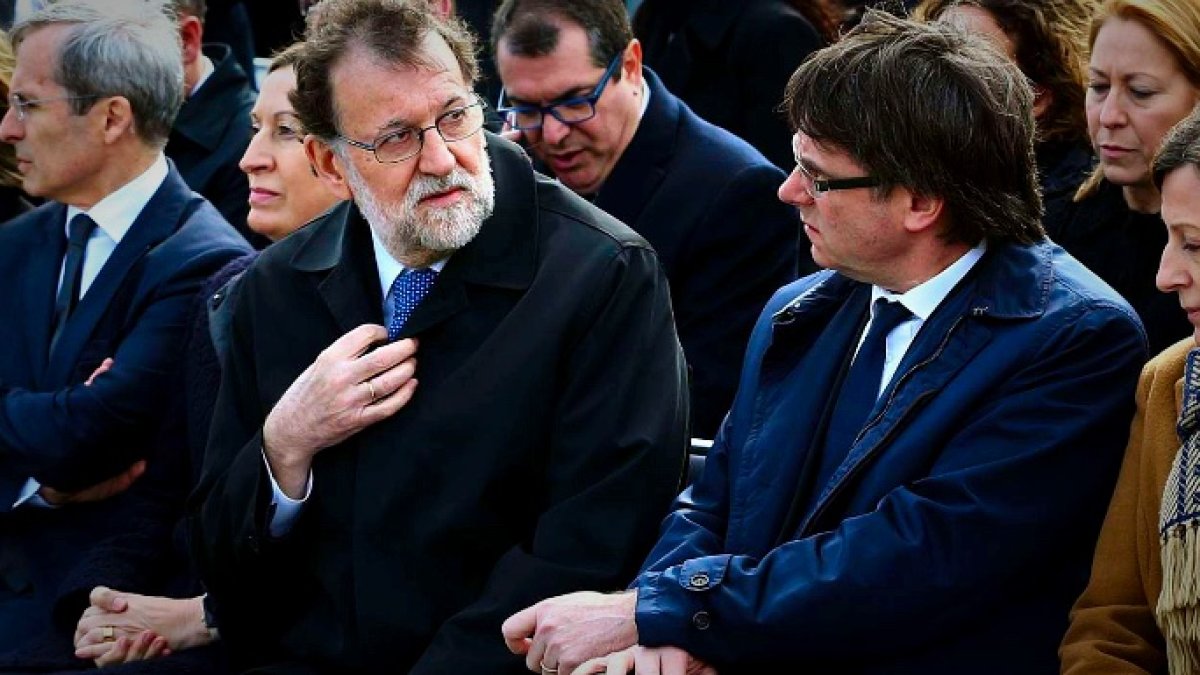 Mariano Rajoy y Carles Puigdemont, durante un acto en Cataluña.