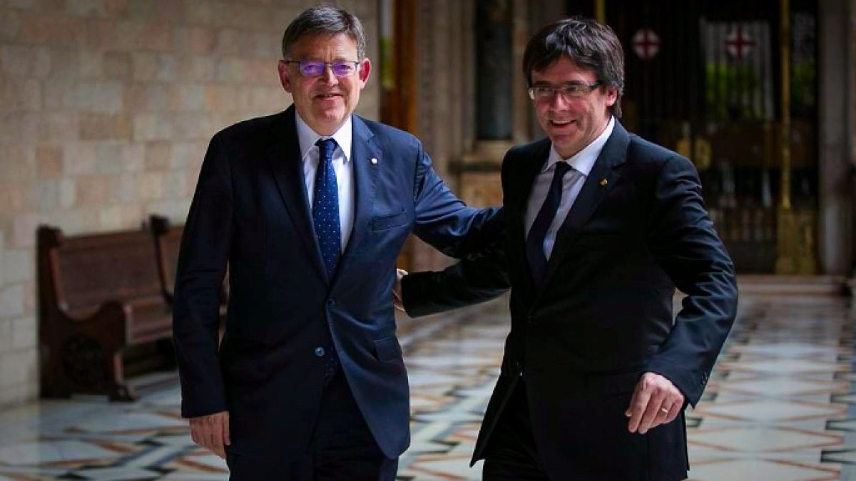 Ximo Puig y Carles Puigdemont, en un encuentro en Valencia.