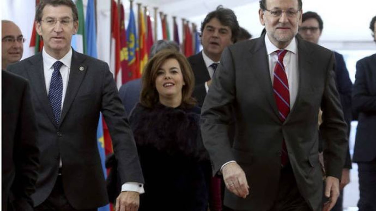 Feijóo, Saez de Santamaría y Rajoy,