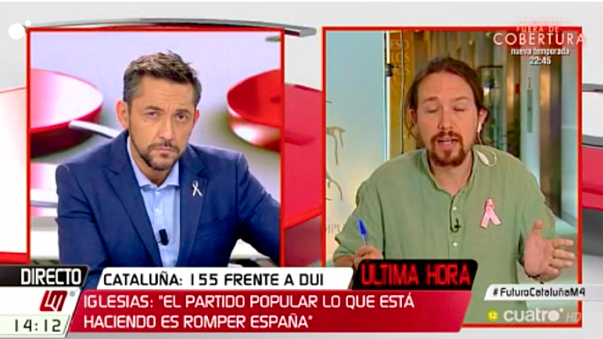 Un momento de la enorme tensión entre Pablo Iglesias y Javier Ruiz, en Cuatro.