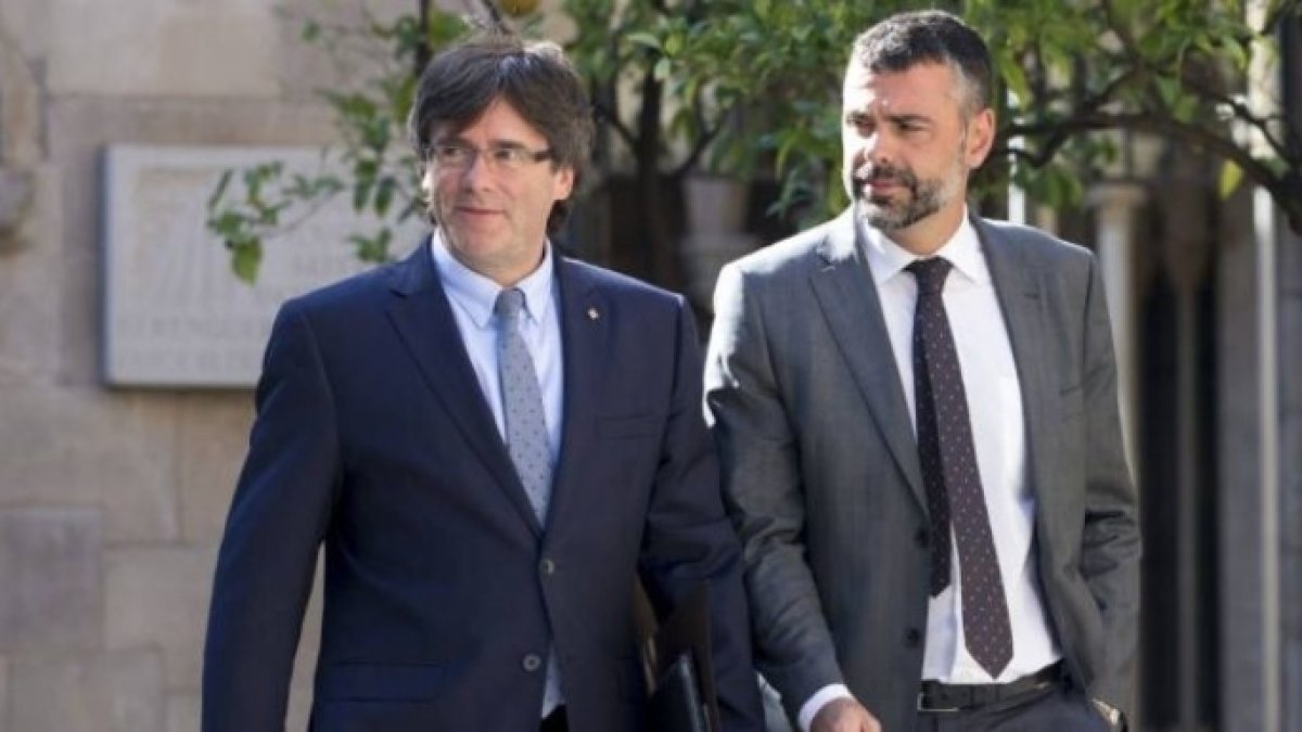 Puigdemont y Santi Vila.
