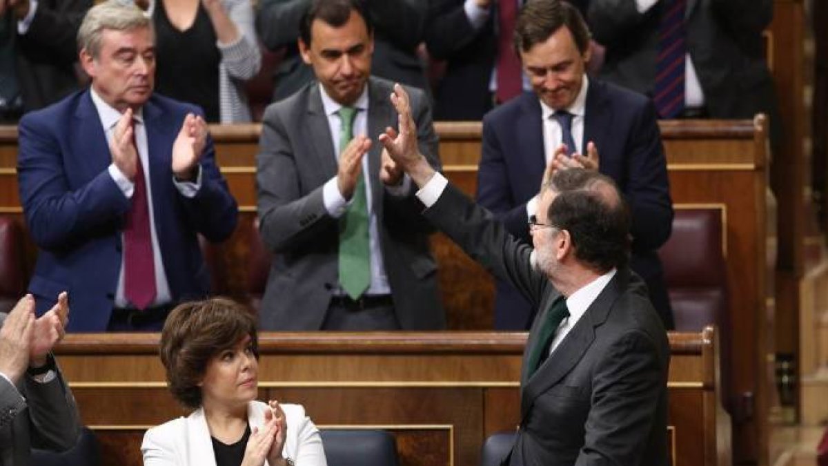 Rajoy, tras despedirse en la tribuna como presidente.
