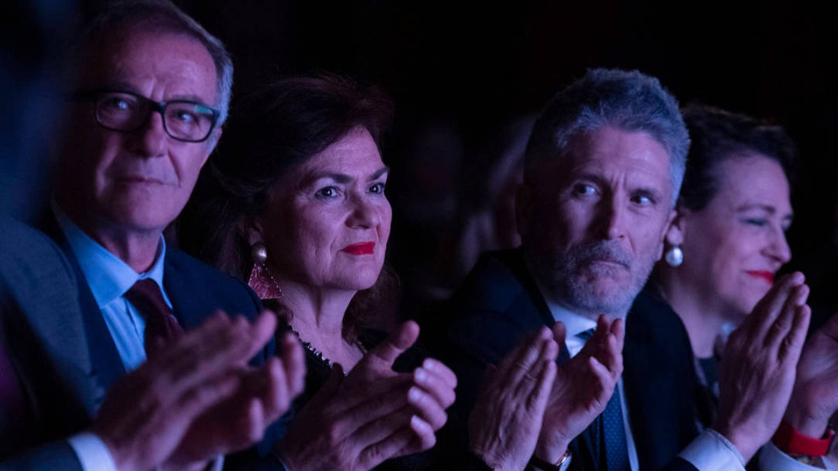Carmen Calvo, entre sus compañeros José Guirao y Fernando Grande-Marlaska.