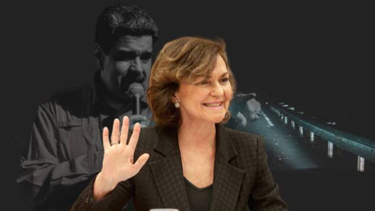 Carmen Calvo, delante de Maduro