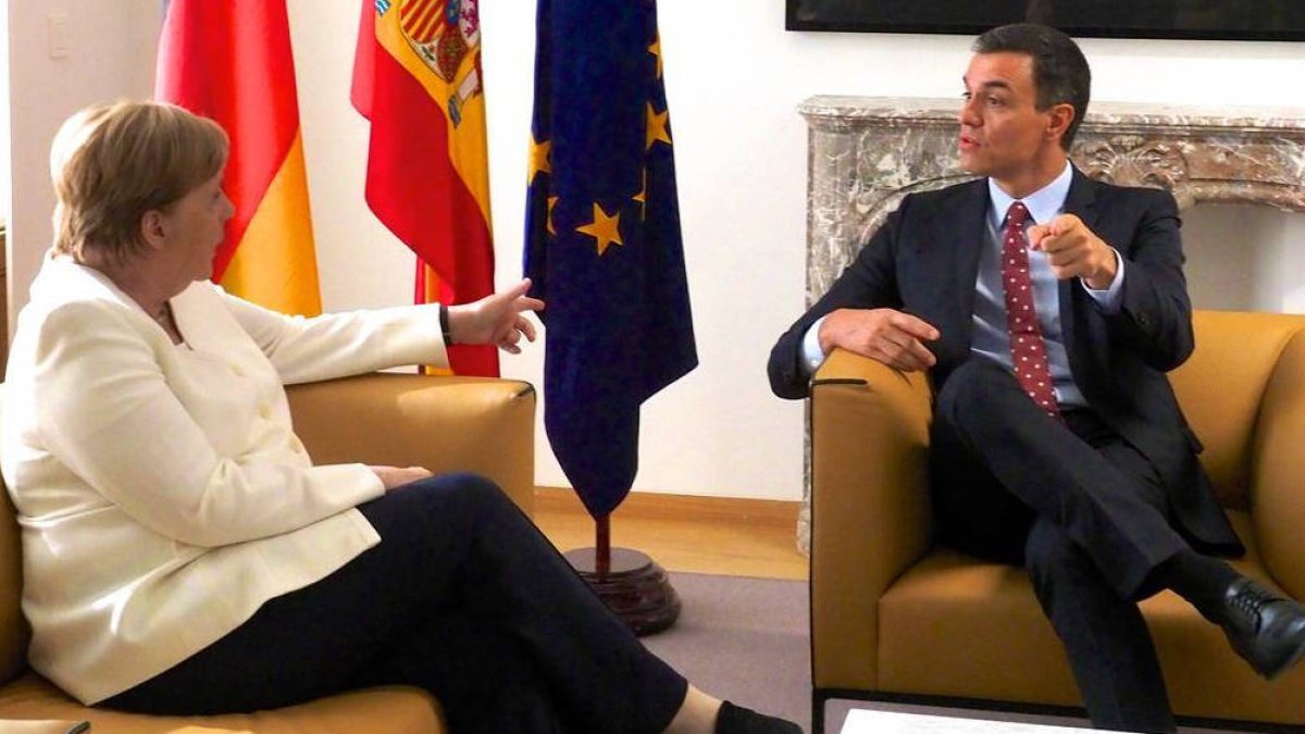 Pedro Sánchez y Angela Merkel