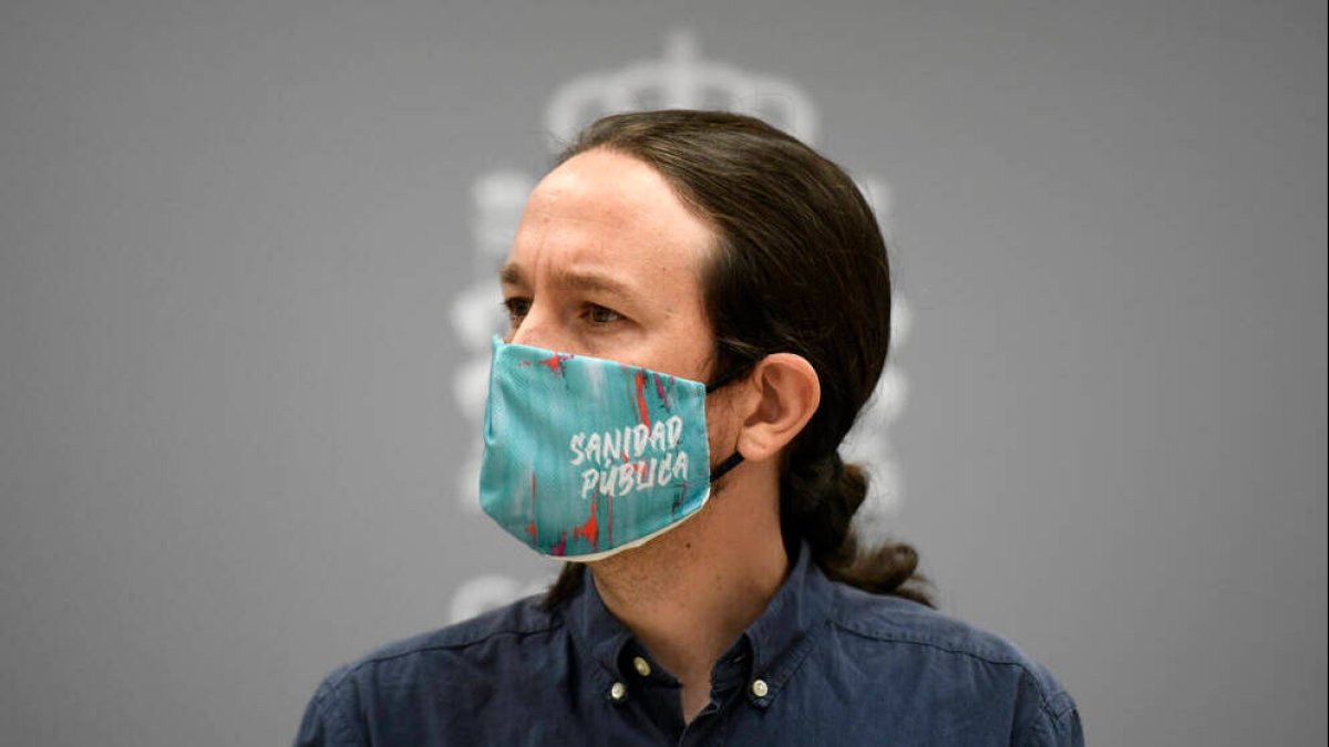 Iglesias con una mascarilla en defensa de la Sanidad pública.