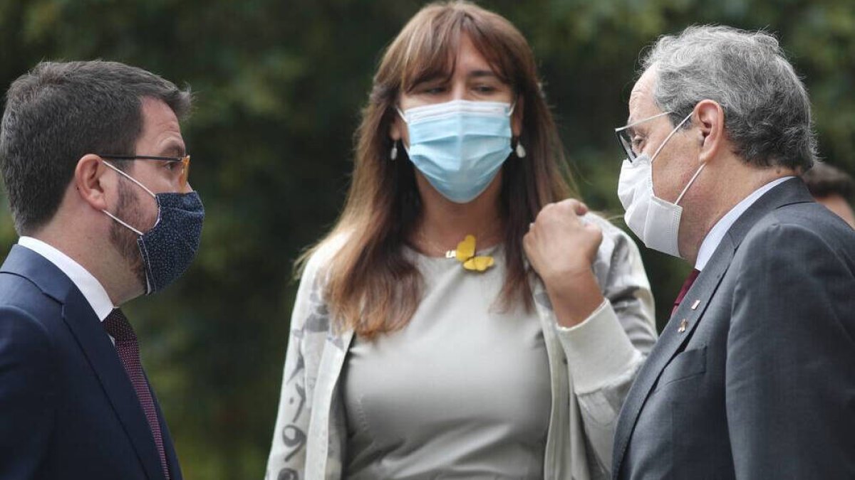 Quim Torra junto a Pere Aragonés y Laura Borrás