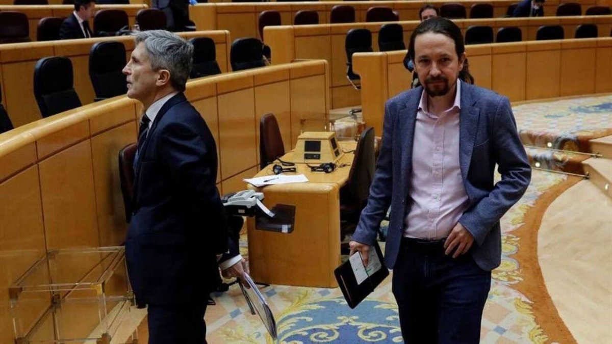Grande Marlaska y Pablo Iglesias en el Congreso.