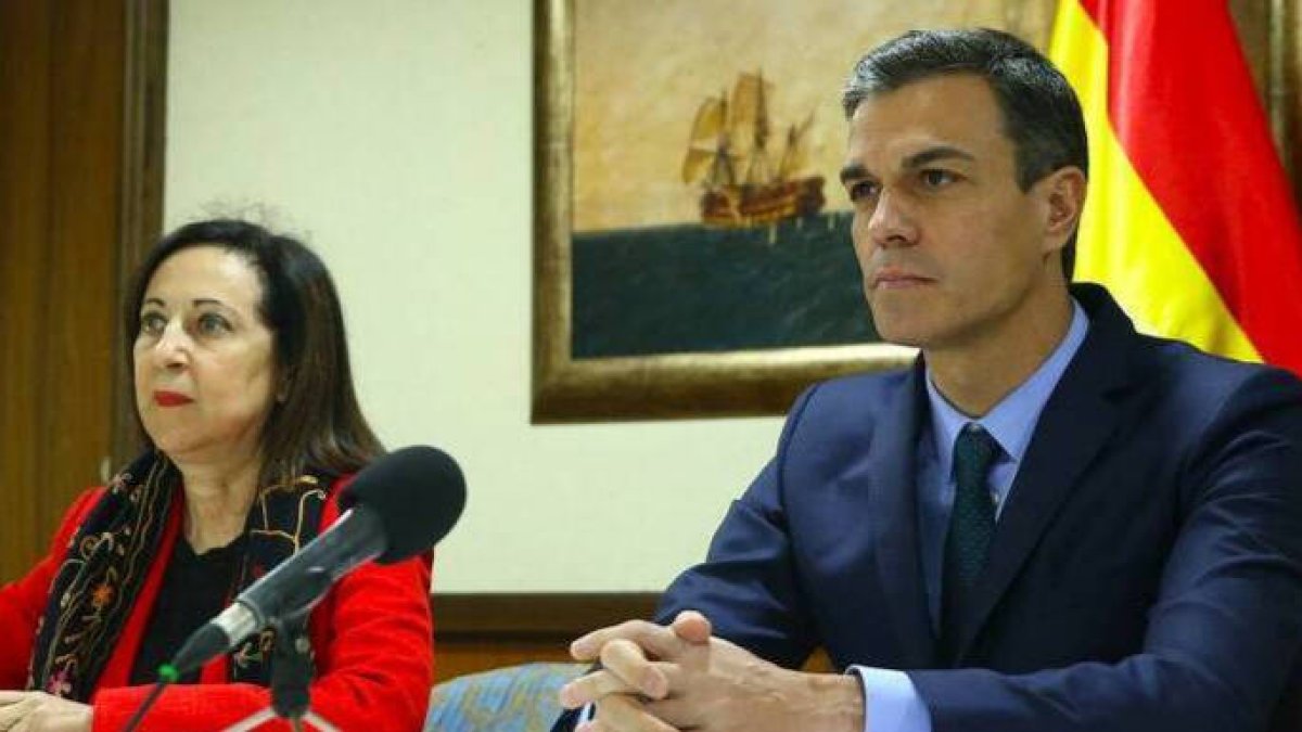 Margarita Robles y Pedro Sánchez