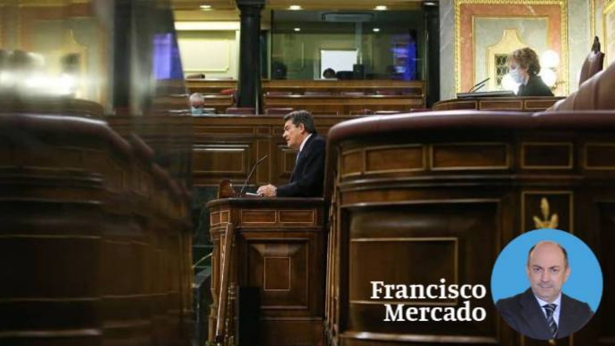 El ministro José Luis Escrivá, este miércoles en la tribuna del Congreso de los Diputados.